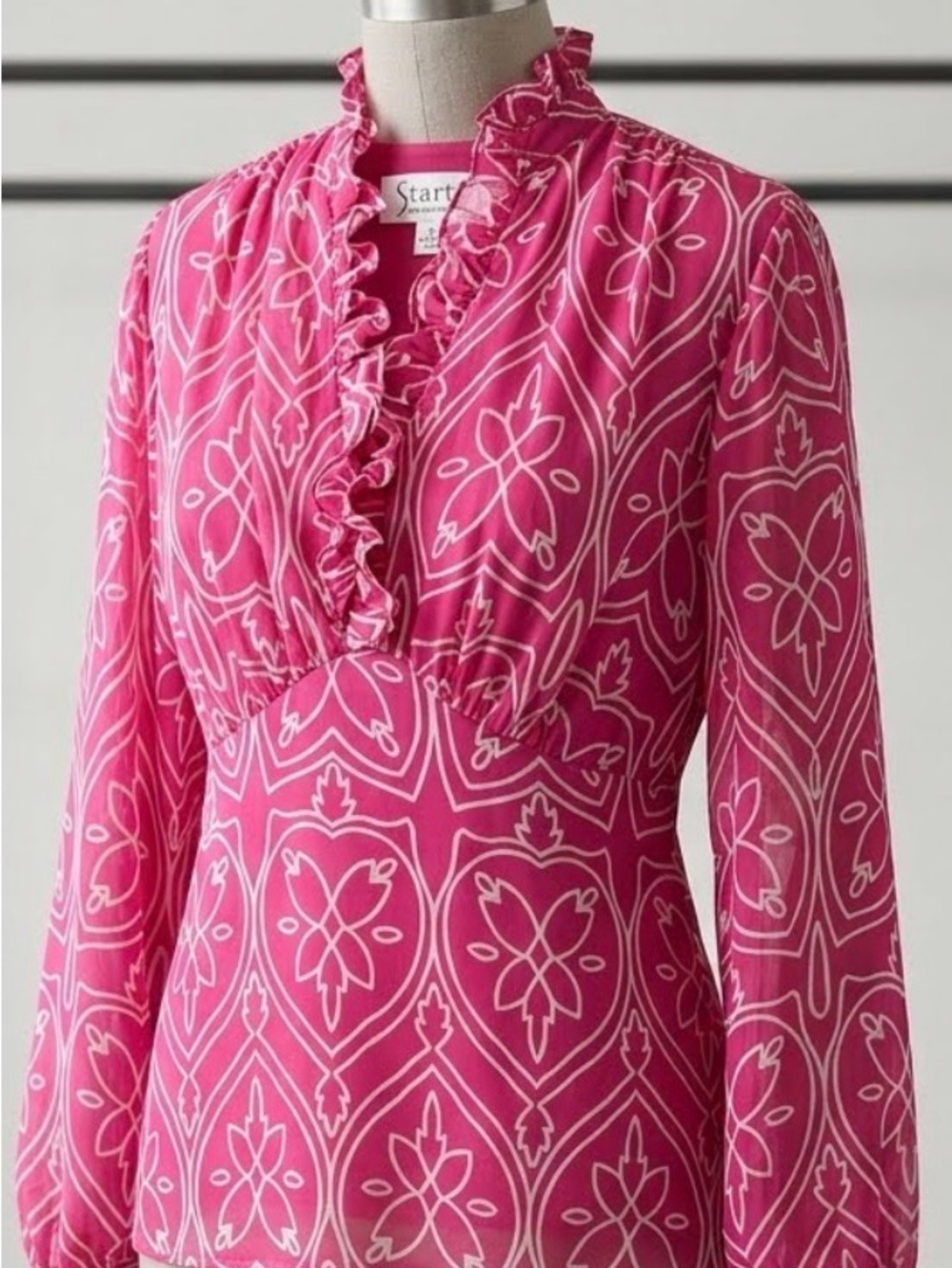 Pink Ruffled Blouse with White Accents